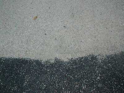 boundary between asphalt and Road Oyl